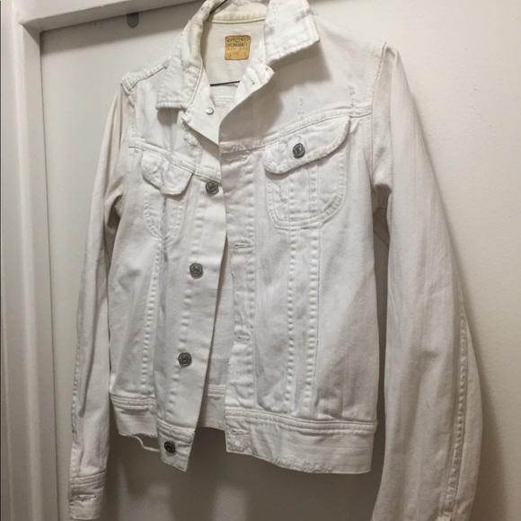 white ripped denim jacket